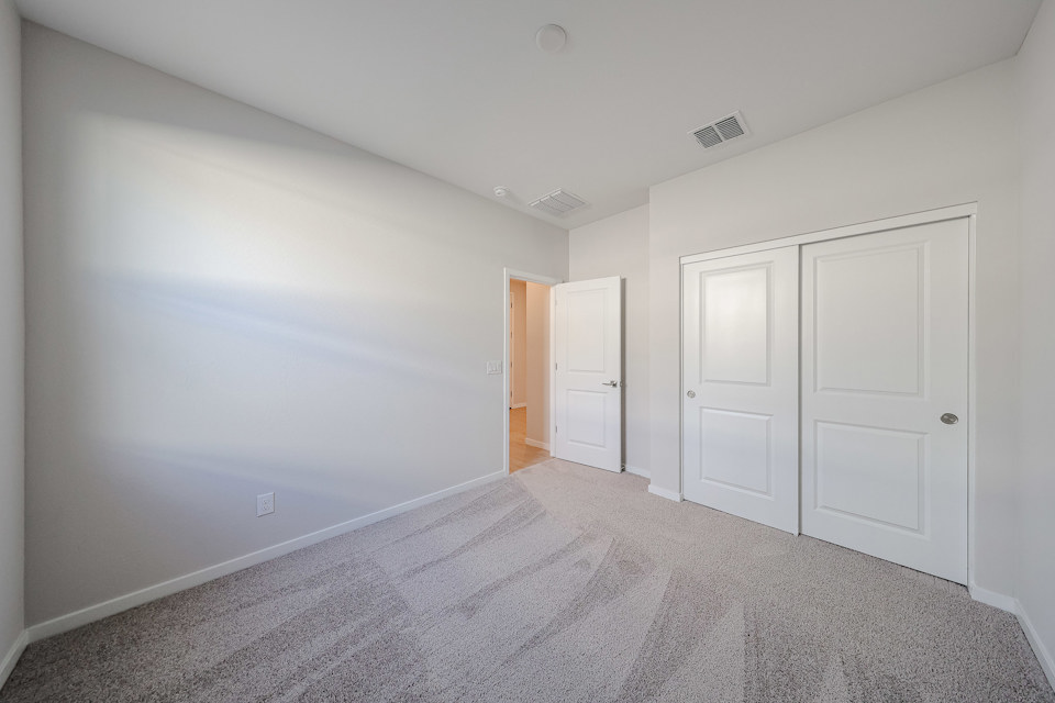 A room with white doors.