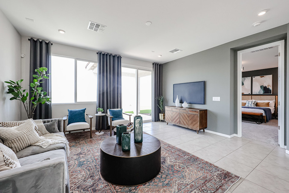 A living room with a large window.