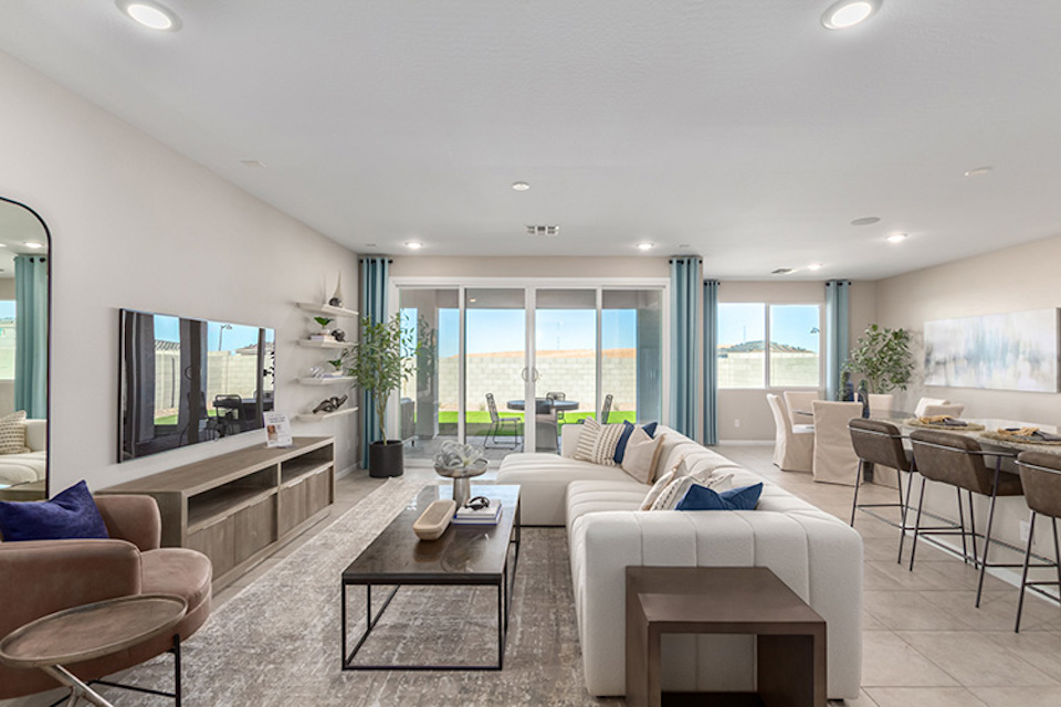 A living room with a large window.