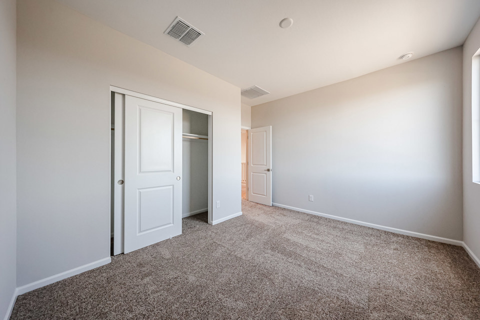 A room with white doors.