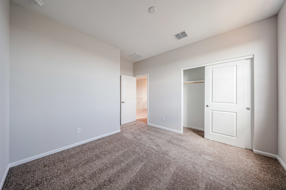 A room with white doors.
