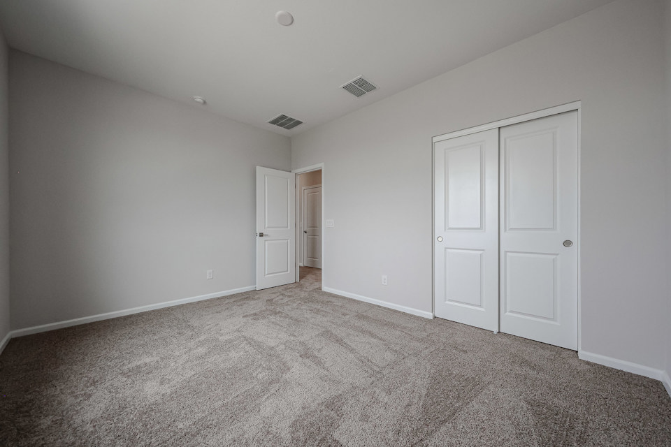 A room with white doors.