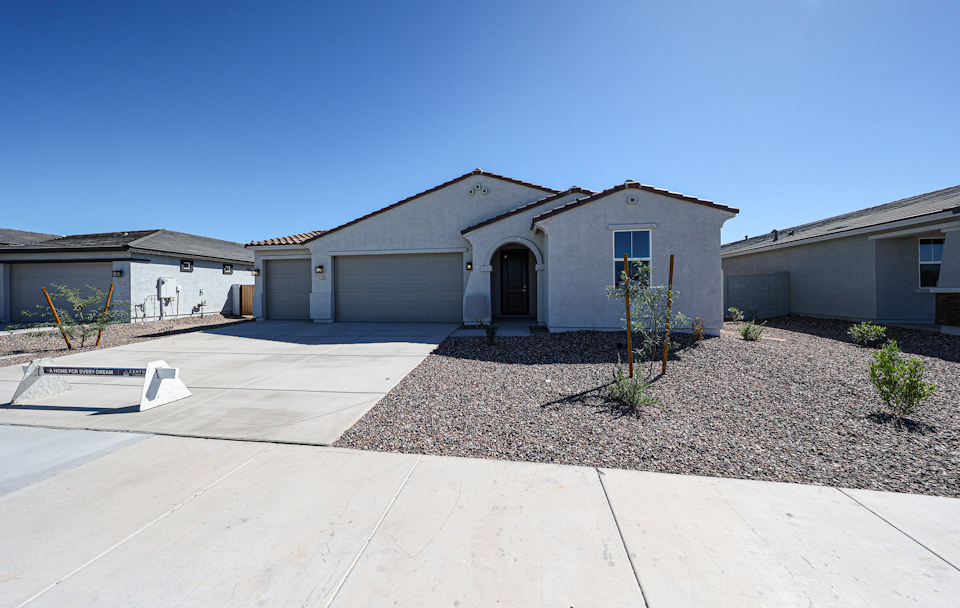 A building with a brick driveway.