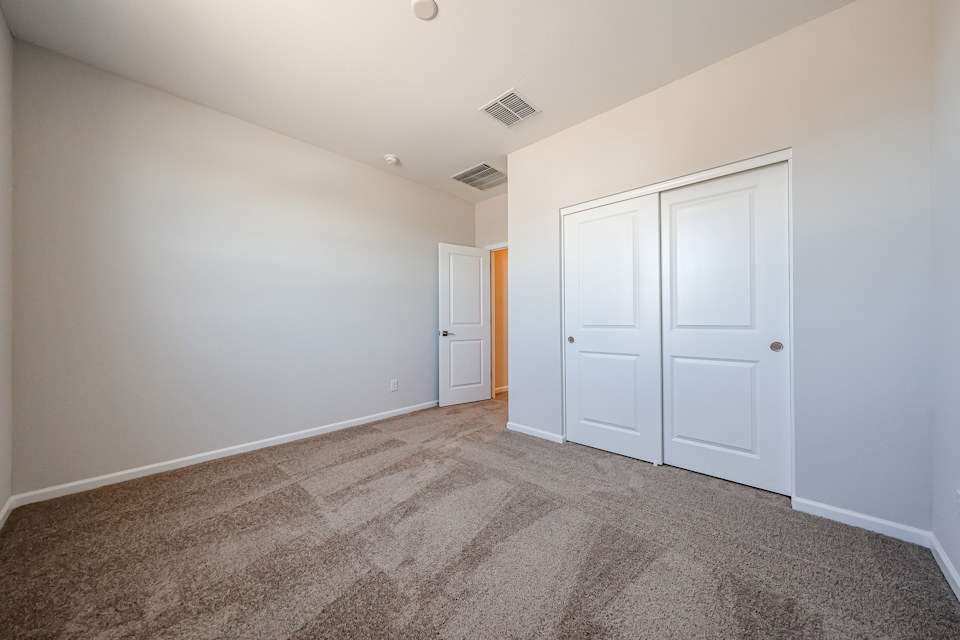 A room with white doors.