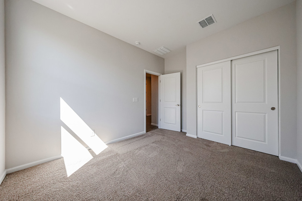 A room with white doors.