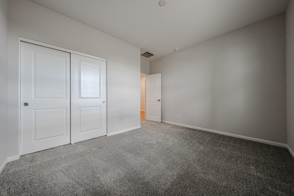 A room with white doors.