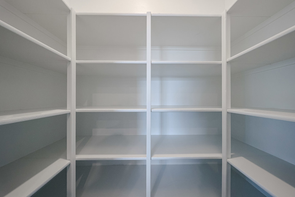A white shelf with white shelves.
