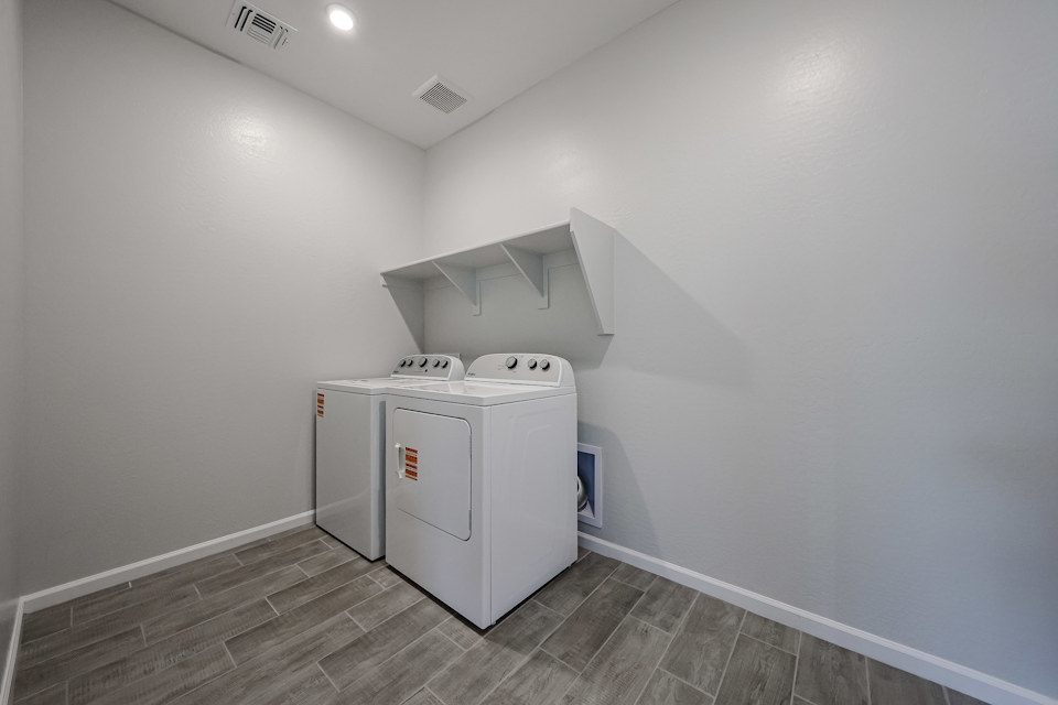 A white machine in a room.