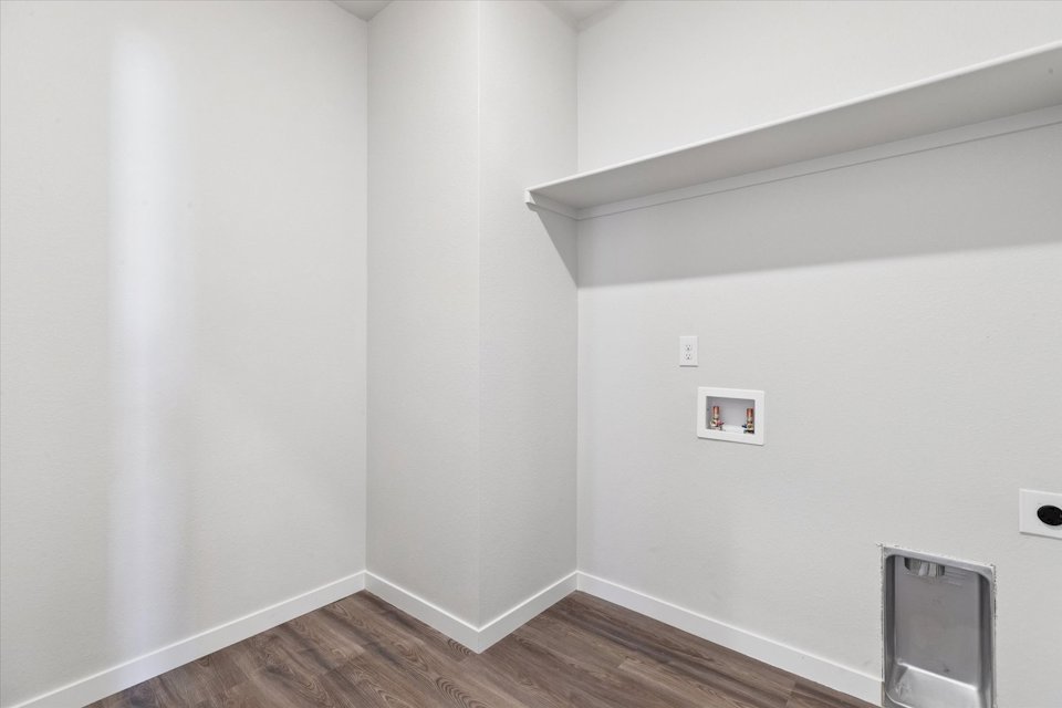 A room with white walls.