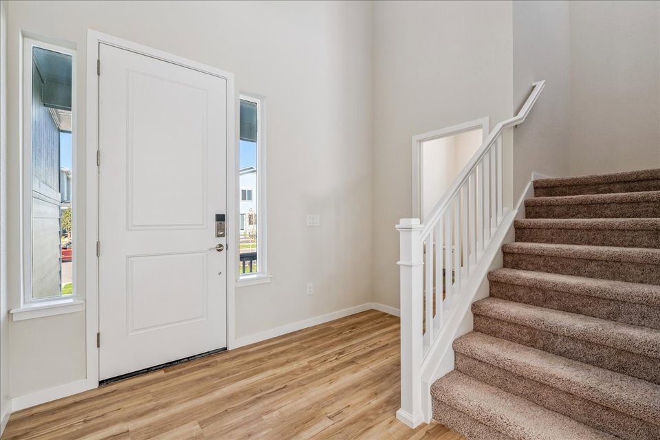 A staircase leading to a door.