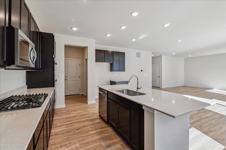 A kitchen with a large island.