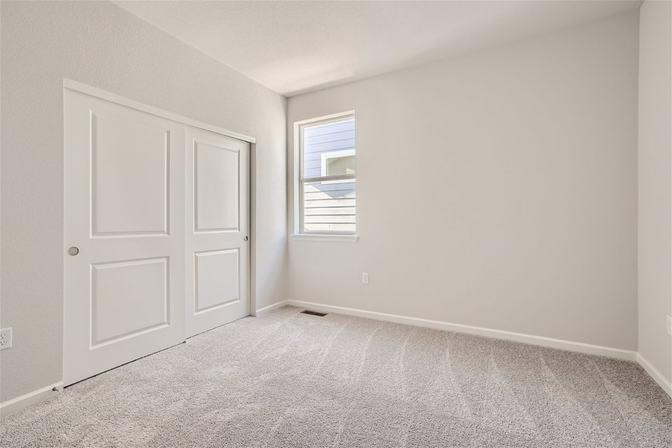 A room with white doors.