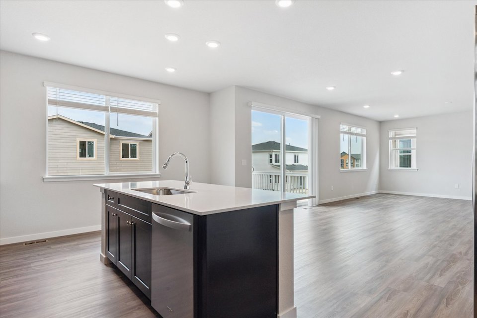 A kitchen with a large island.