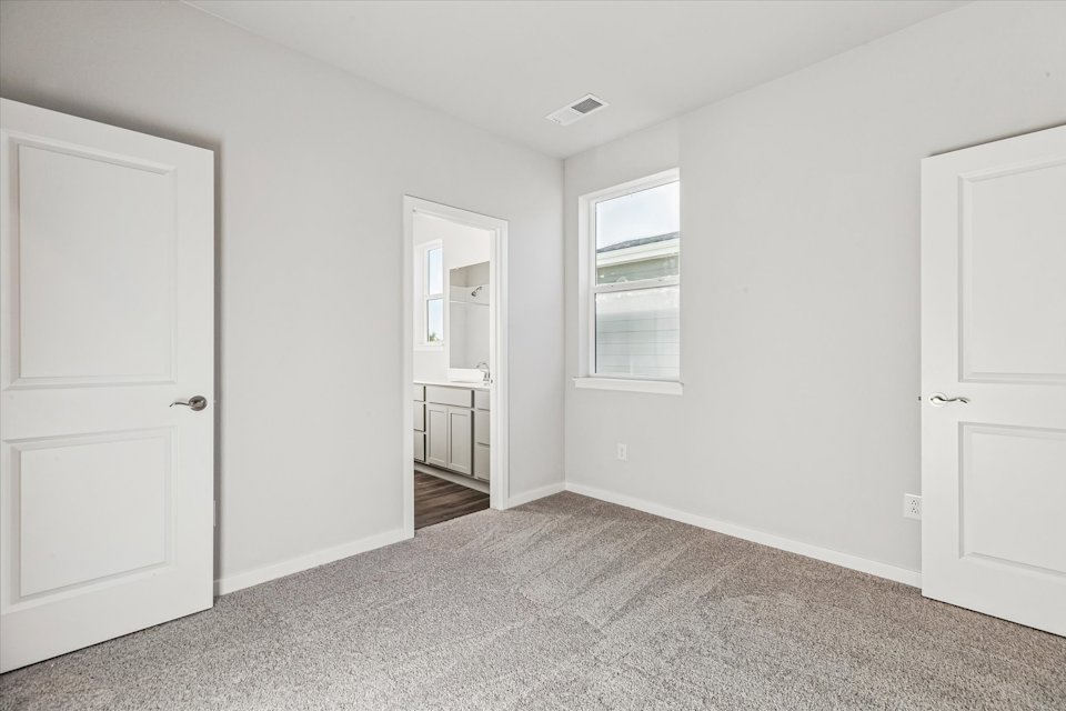 A room with white doors.