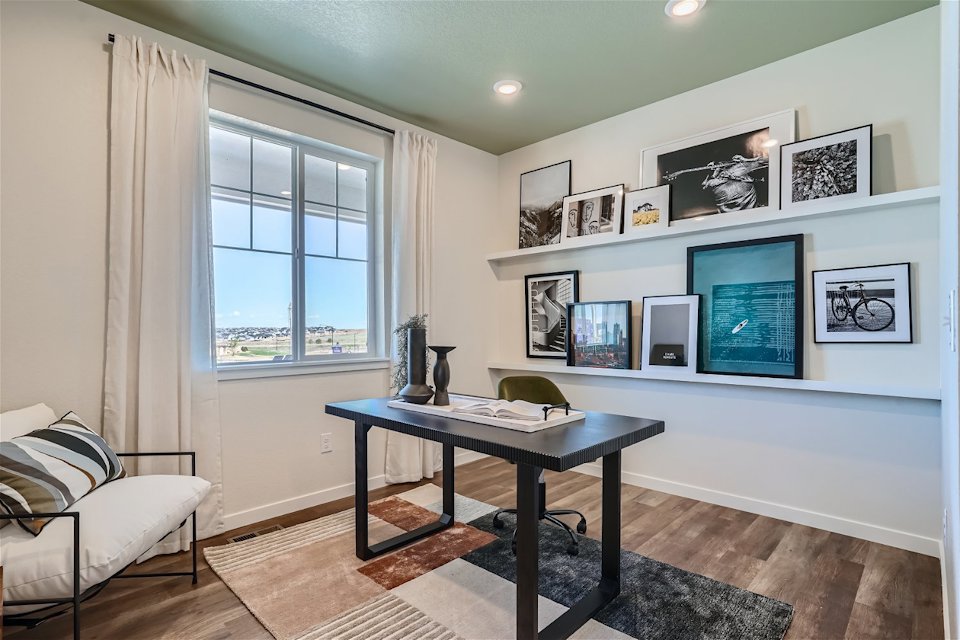 A room with a table and a couch.