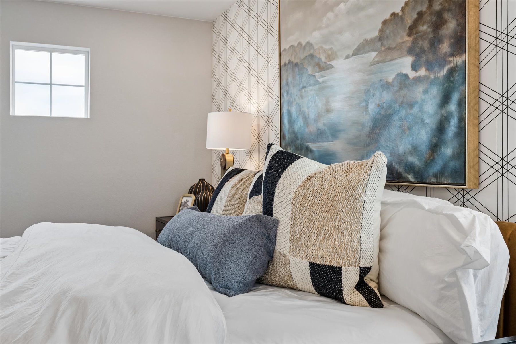 A bed with pillows.