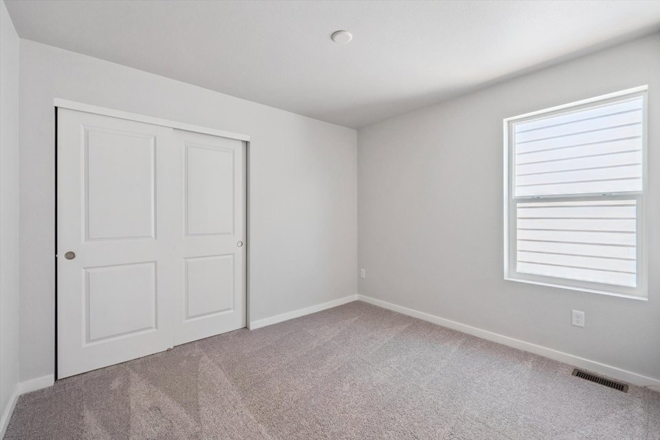 A room with white doors.