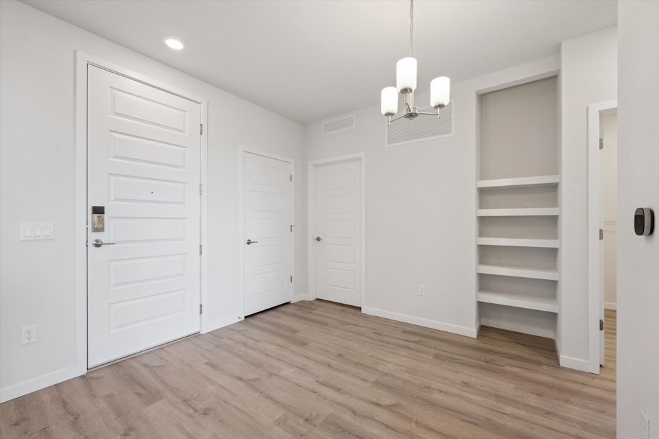 A room with white doors.