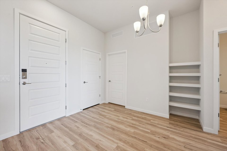 A room with white doors.