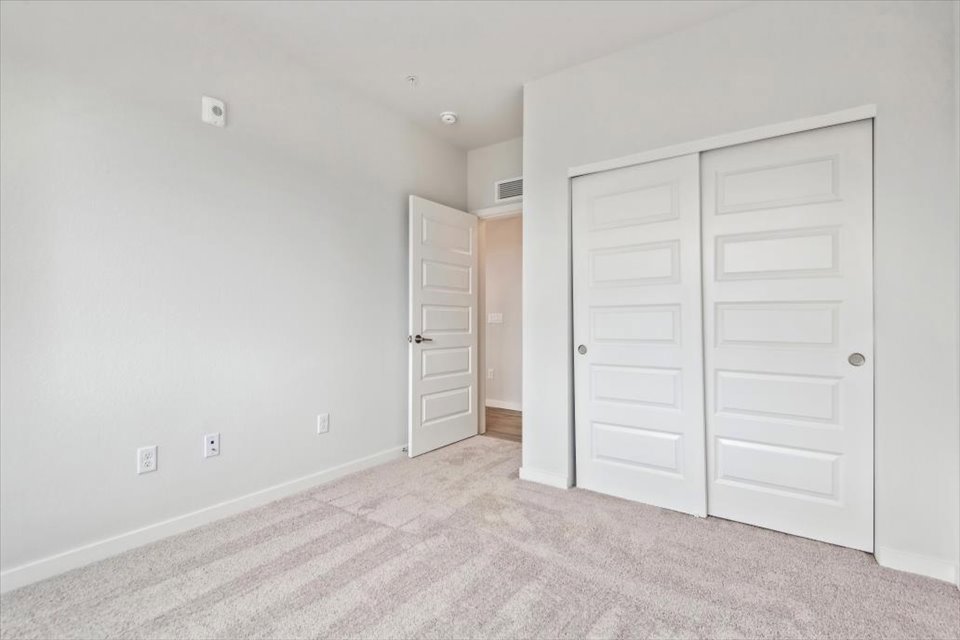 A room with white doors.