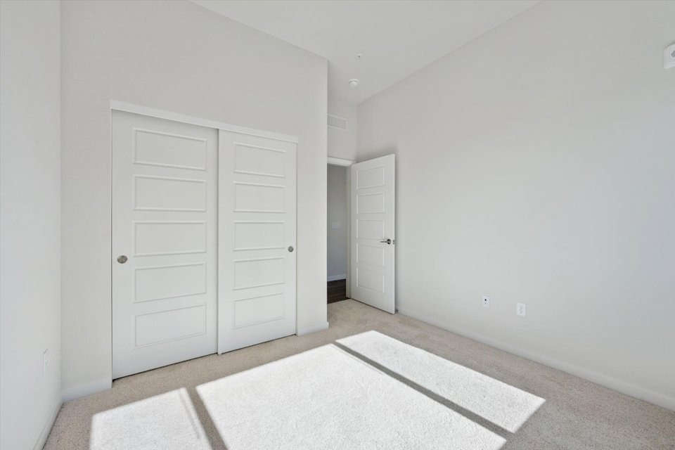 A room with white doors.