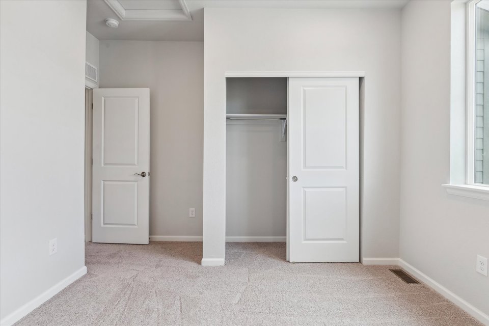 A room with white doors.