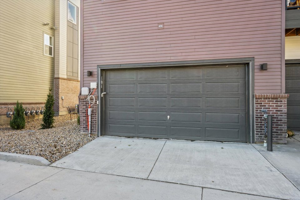 A garage door with a metal gate.