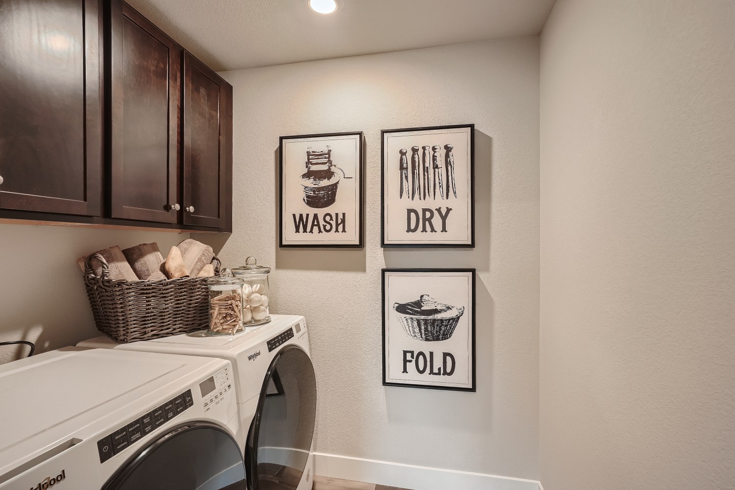 A kitchen with a white stove and a white radiator.