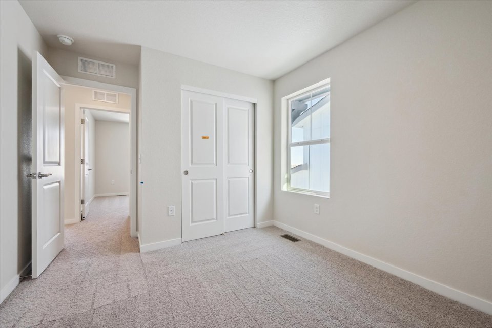 A room with white doors.