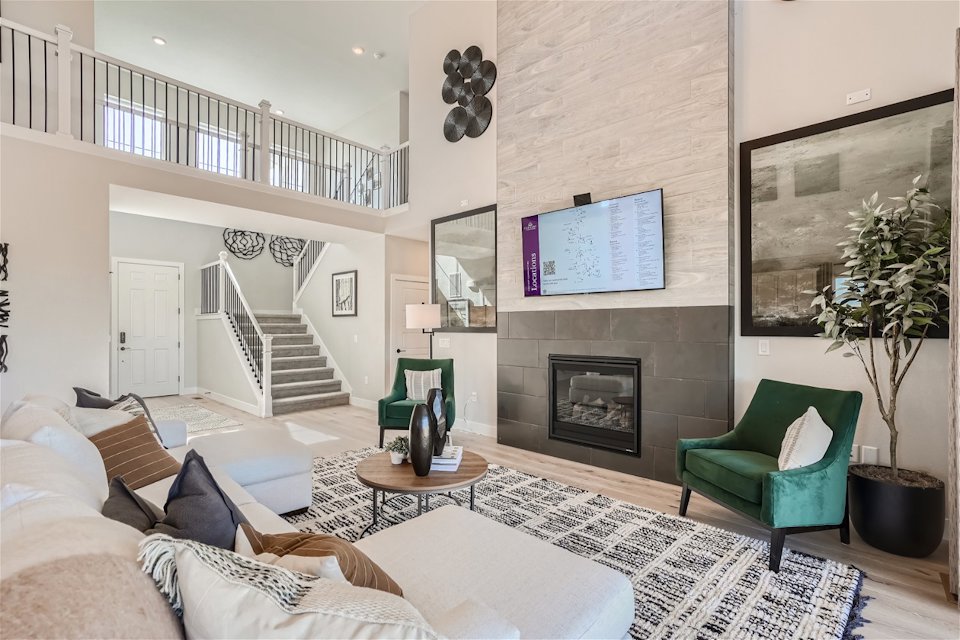 A living room with a fireplace.