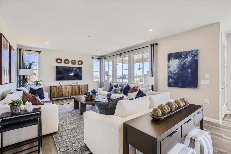 A living room with a large window.