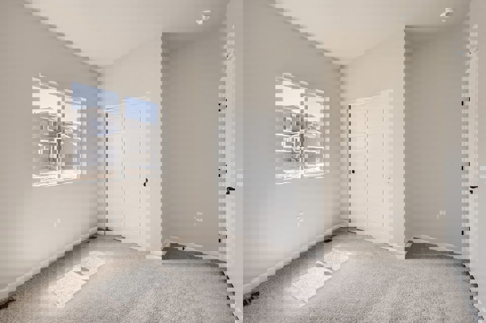 A room with white doors.