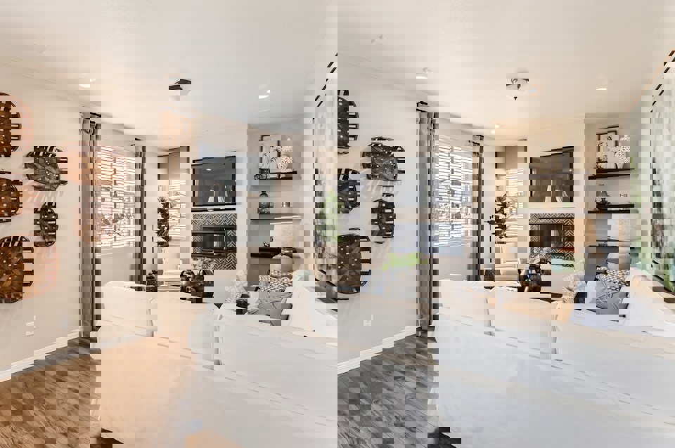 A living room with a white couch.