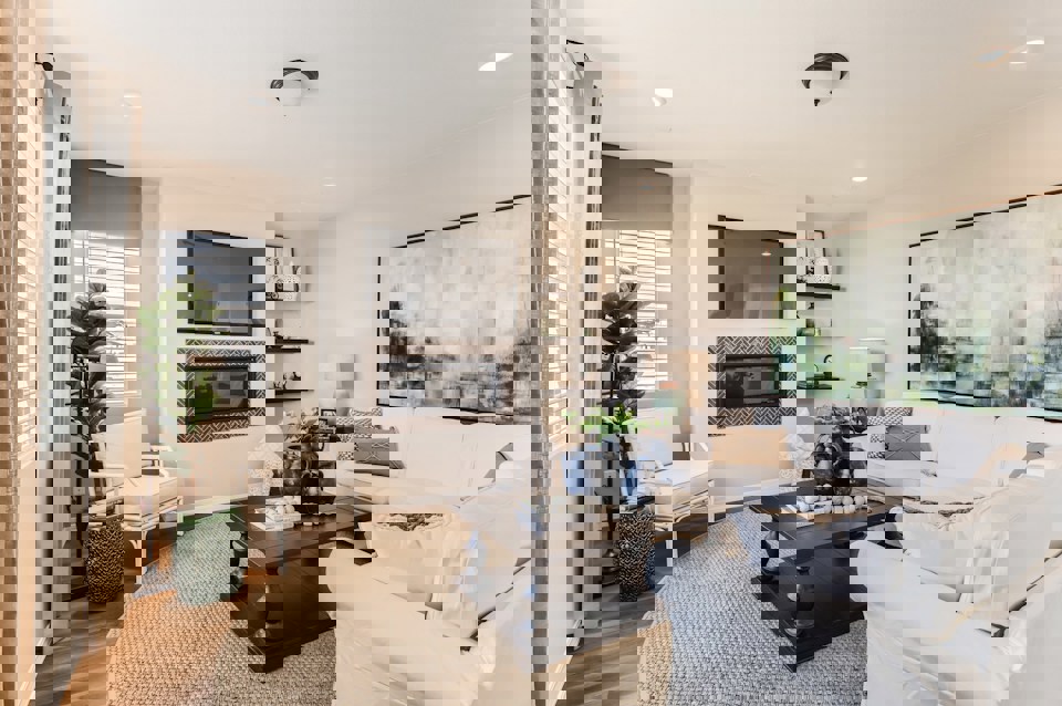 A living room with a fireplace.