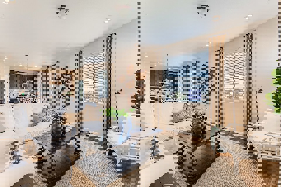 A living room with a couch and a coffee table.