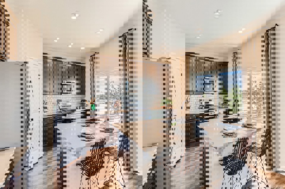 A kitchen with a large island.