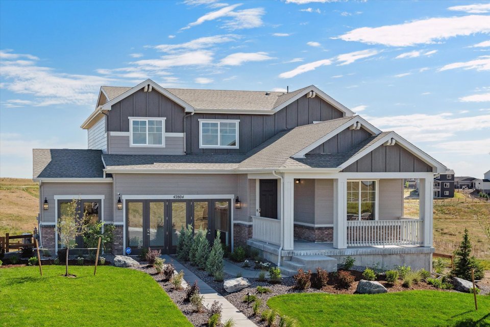 A house with a large front yard.