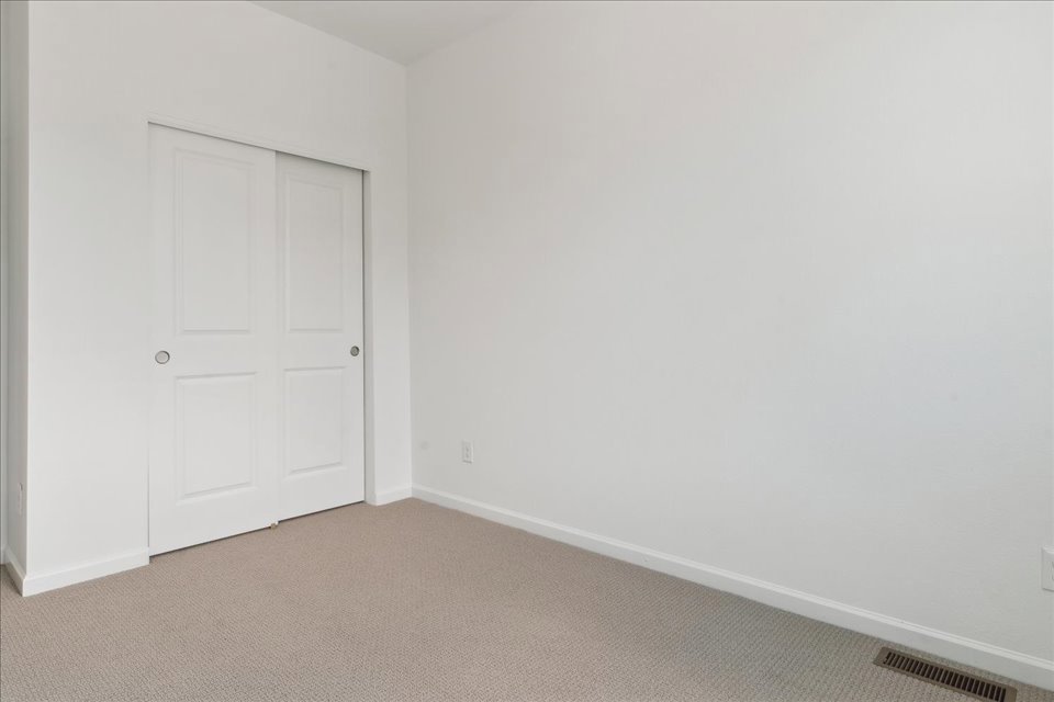 A room with white doors.