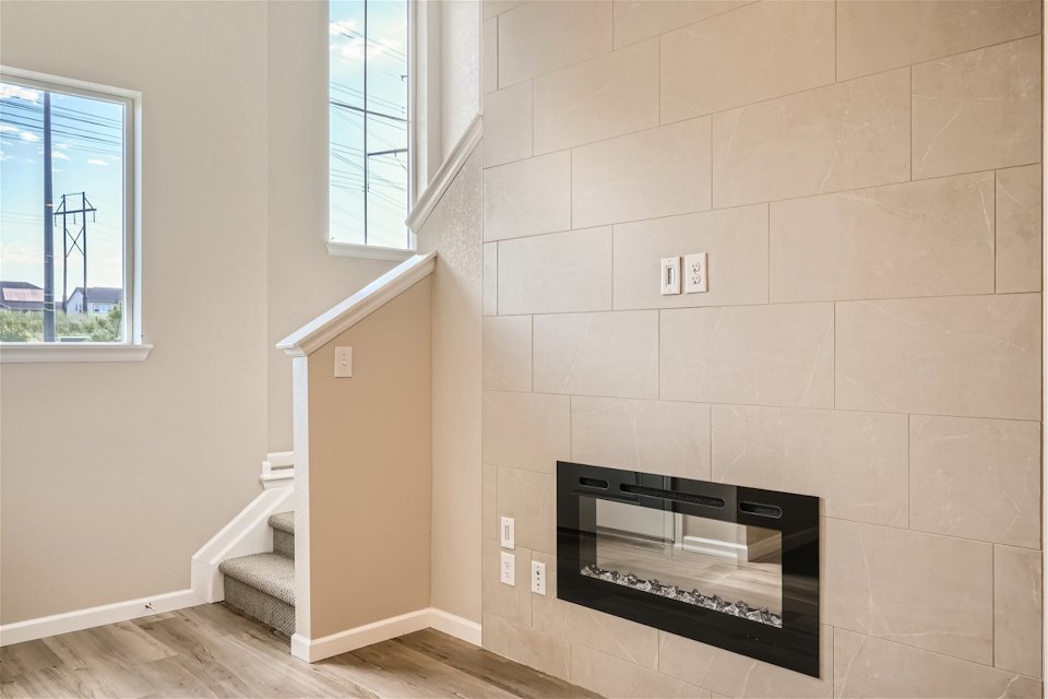 A fireplace in a room.