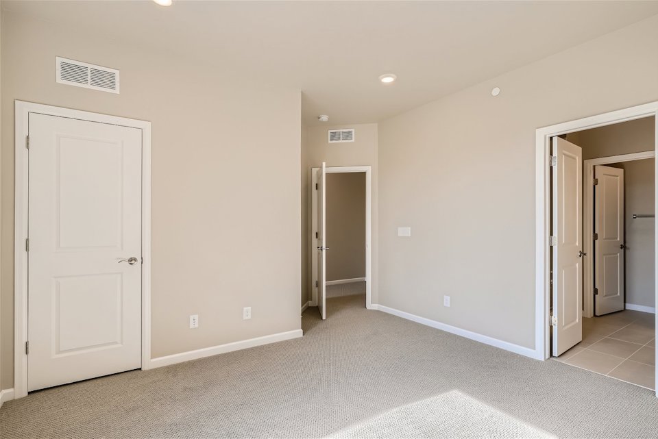 A room with white doors.