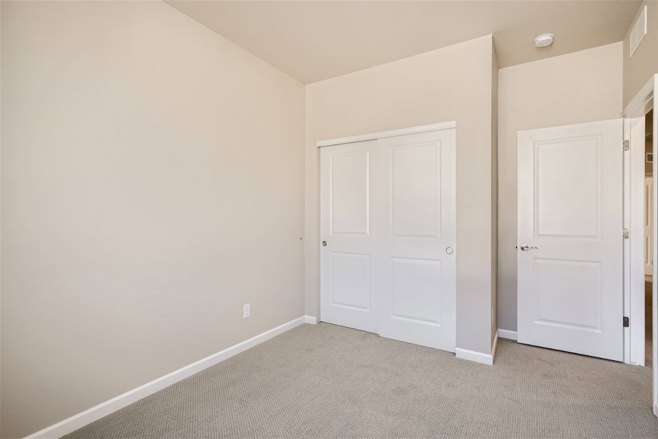 A room with white doors.