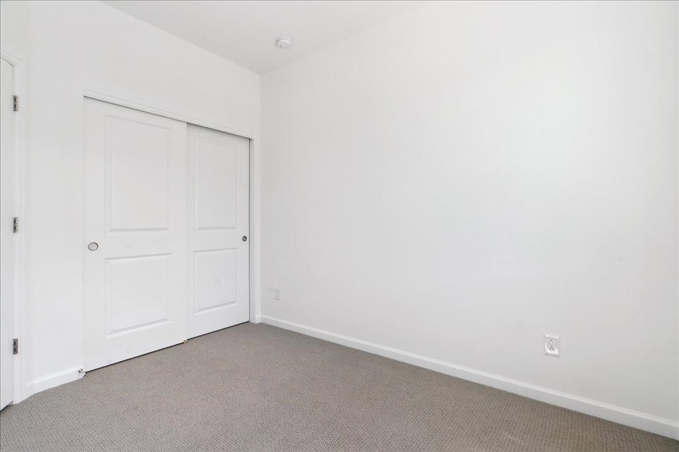 A room with white doors.