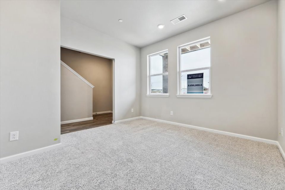 A room with a door and a window.