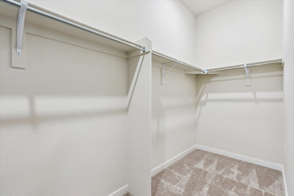 A white tiled hallway.