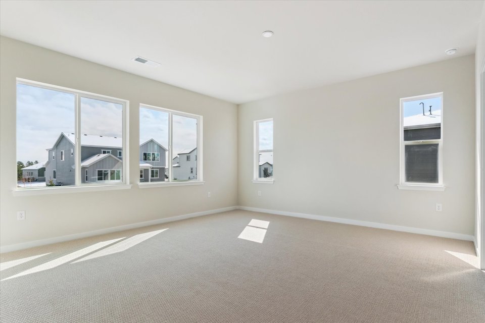 A room with a large window.