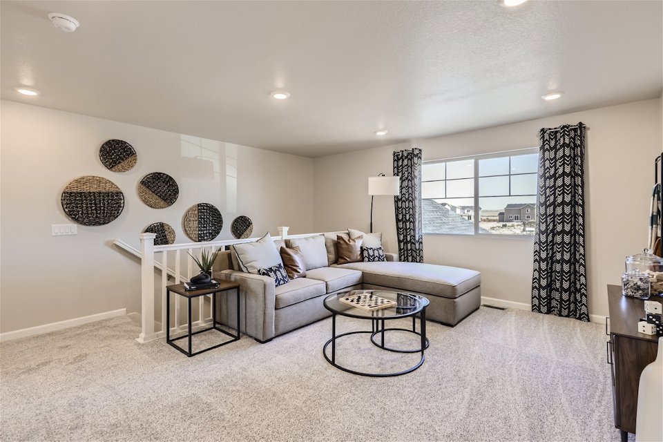 A living room with a couch and a coffee table.