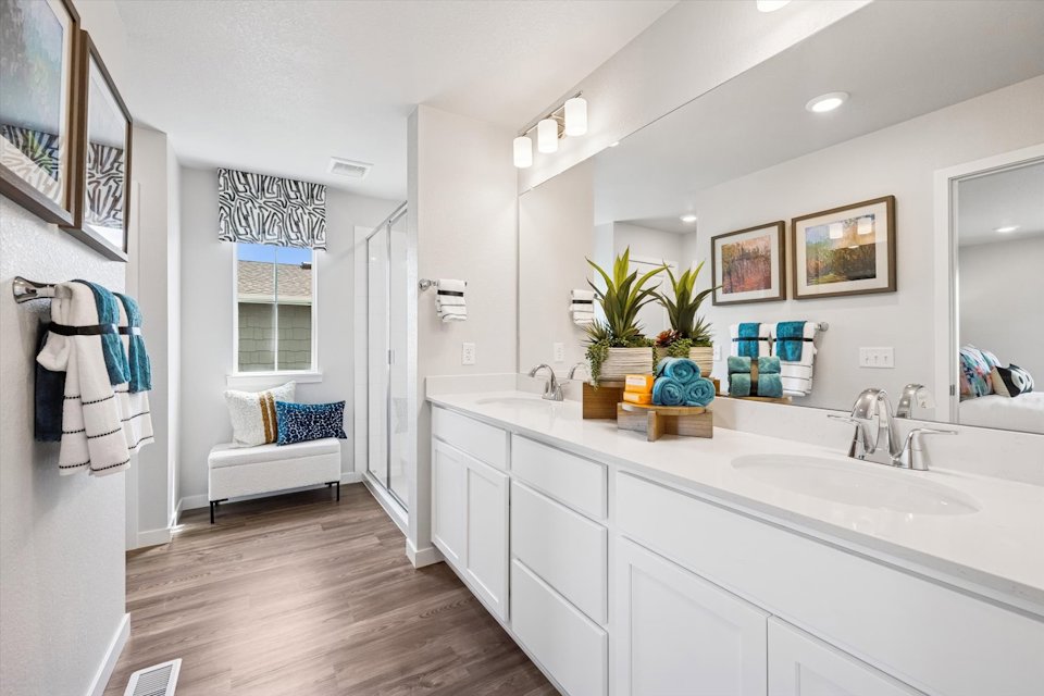 A bathroom with a tub and sink.