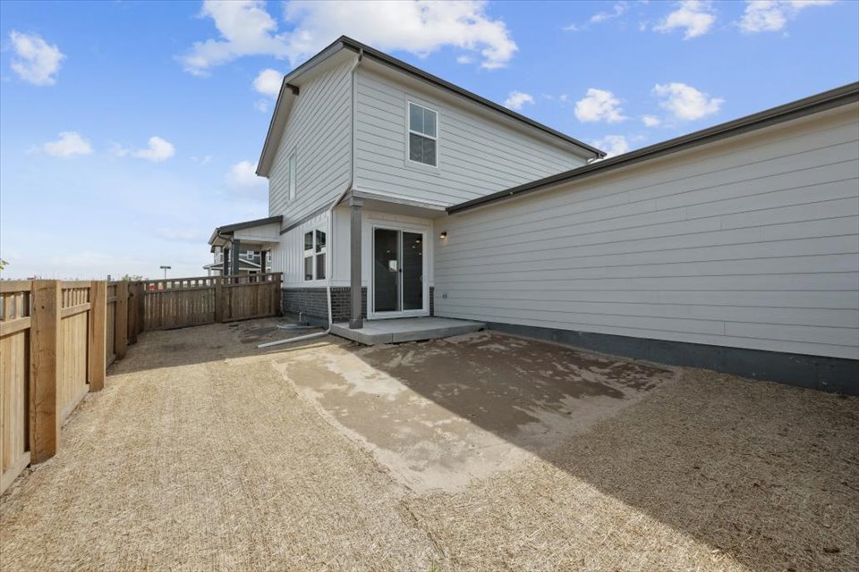 A house with a fence around it.