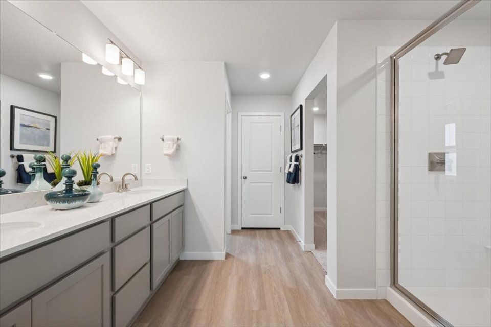 A bathroom with a glass shower.
