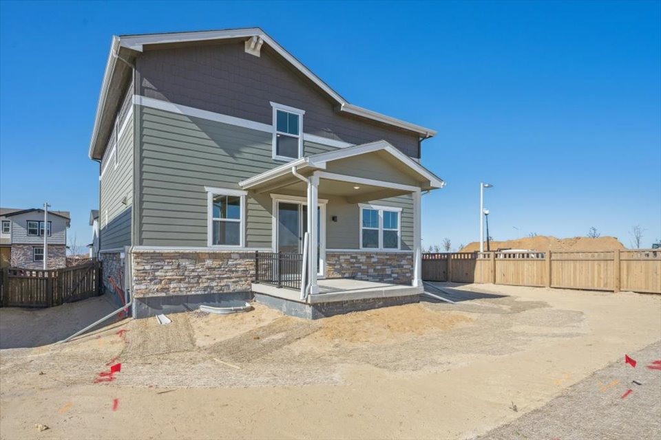 A house with a fence around it.